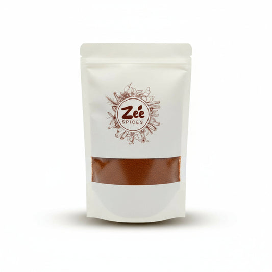 White pouch of Zée Spices on a white background include hot mixture blend