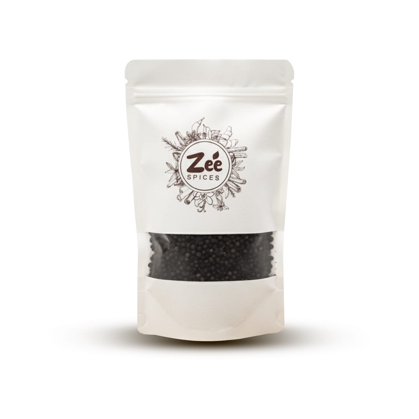 White pouch of Zé Spices with whole black pepper on a white background