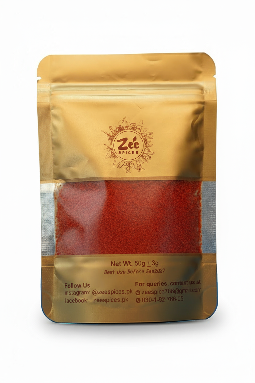 Zee Spices packaging with visible red chili powder spices inside on a white background