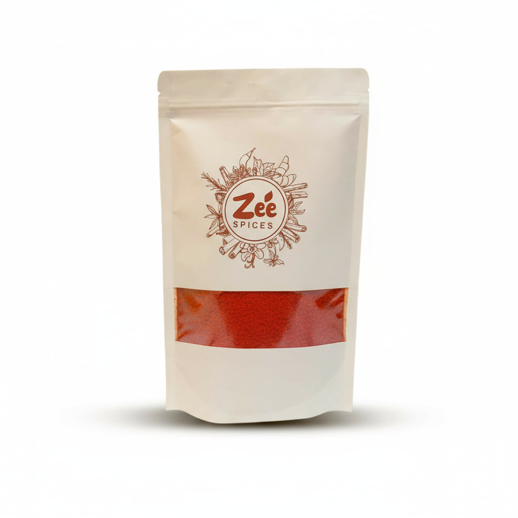 Zee Spices packaging on a white background containing red chili powder